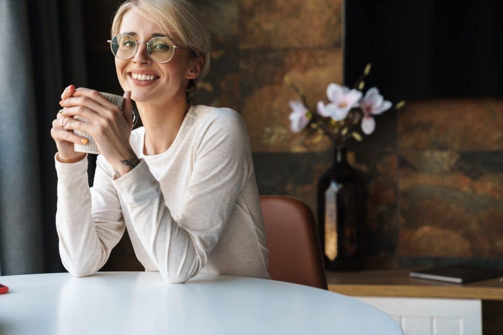 Smiling young woman wearing casual clothes